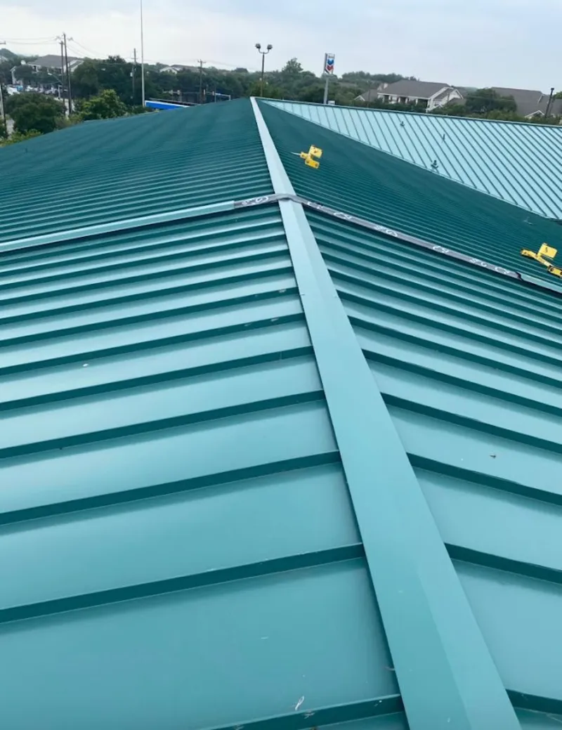 Green commercial metal roof ridge and valley for Metal Roof Repair in Patterson